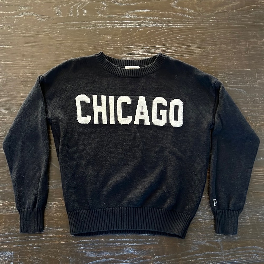 VS Pink sweater in black with white lettering in size Med